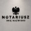 Nowoczesny logotyp kancelarii notarialnej z orłem w koronie.
